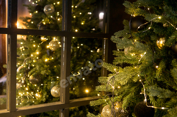 Balls on the Christmas tree shut-up. Christmas tree assemble decorations.